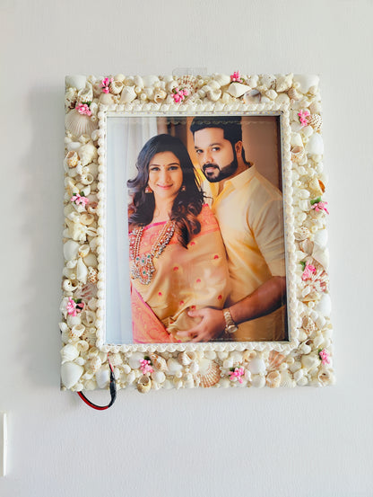Handcrafted Seashell Photo Frame with Floral Accents – Coastal Elegance for Cherished Memories - Shellkrafts